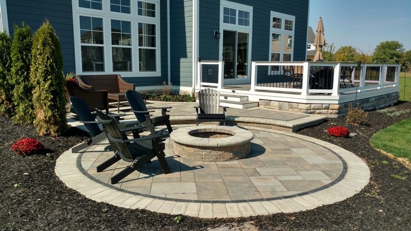 deck with patio and fire pit